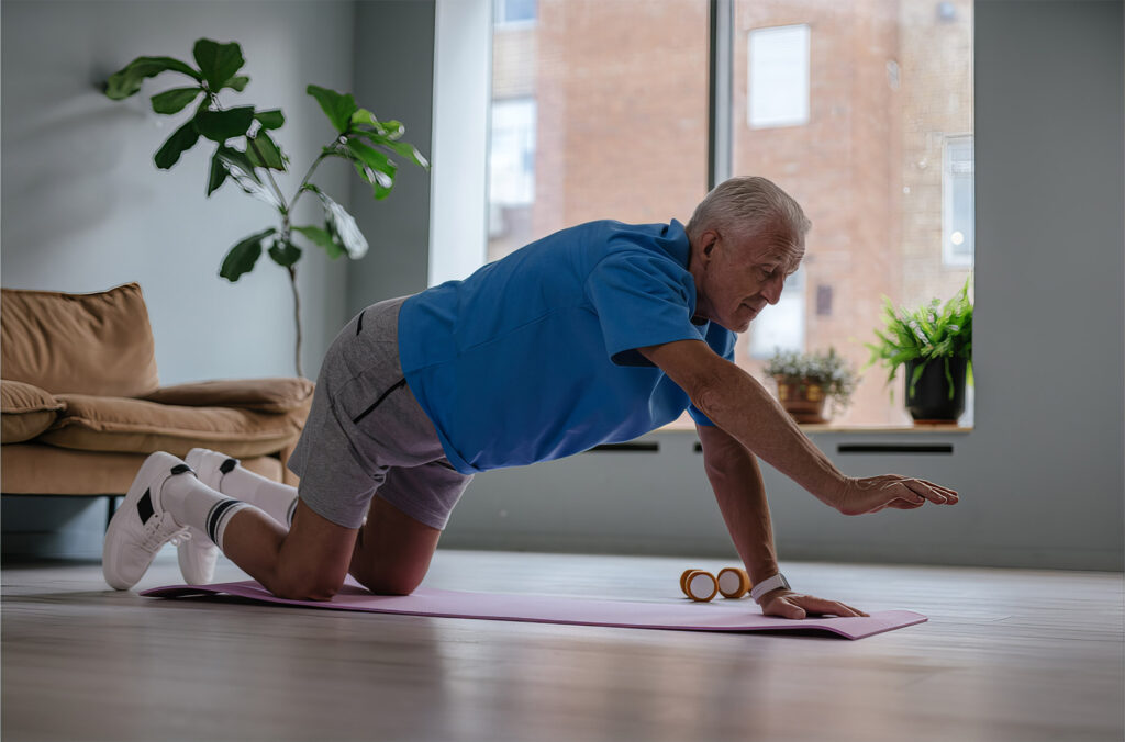 enior woman doing single-leg balance exercise at home